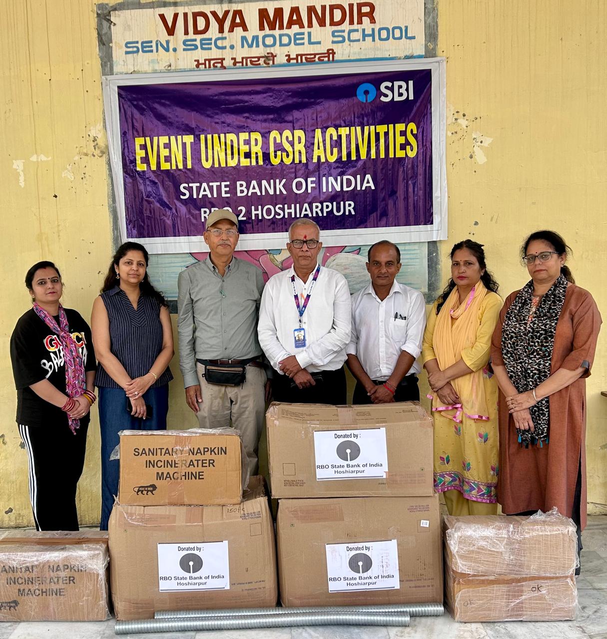 SBI distributes sanitary pad incinerators and kits at Vidya Mandir Senior Secondary Model School, Hoshiarpur